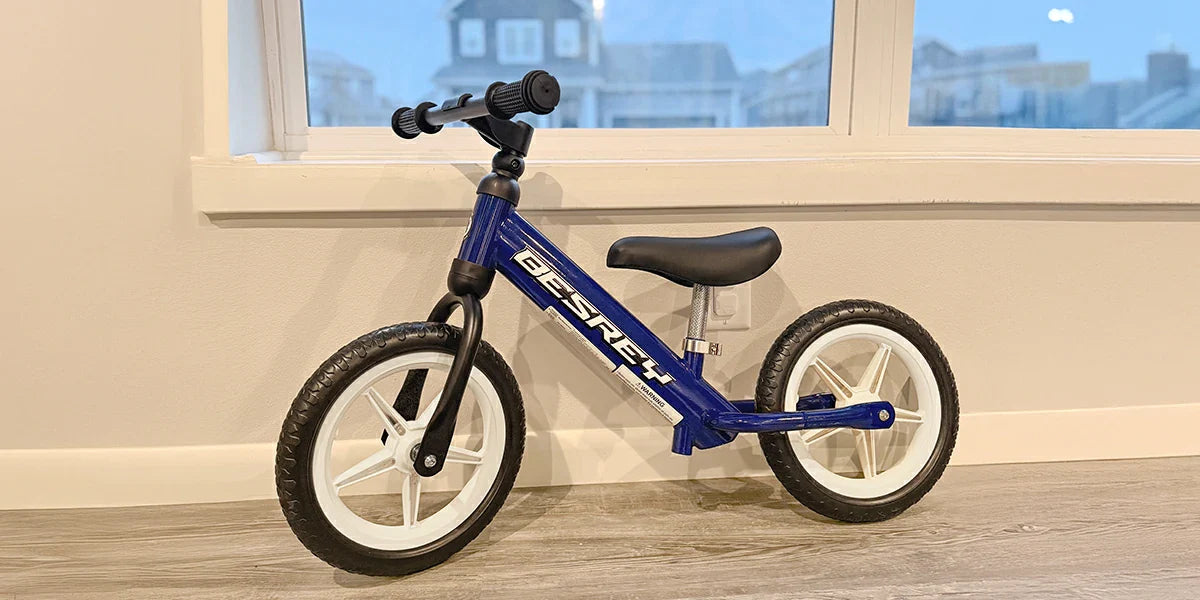 How do I teach my child to ride a balance bike?